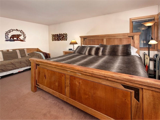 bedroom with light colored carpet