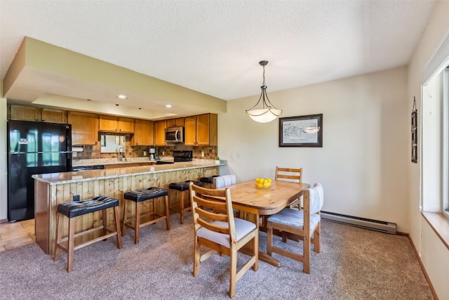 4612 Ryan Gulch Rd Unit 4612, Silverthorne, CO 80498 - dining room with baseboard heating, light carpet, a textured ceiling, and recessed lighting