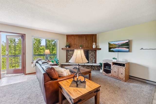 4612 Ryan Gulch Rd Unit 4612, Silverthorne, CO 80498 - living room with a textured ceiling, light colored carpet, and baseboard heating