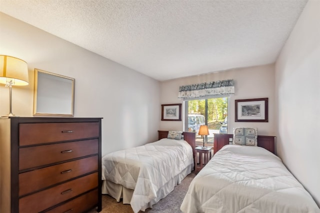 4612 Ryan Gulch Rd Unit 4612, Silverthorne, CO 80498 - carpeted bedroom with a textured ceiling