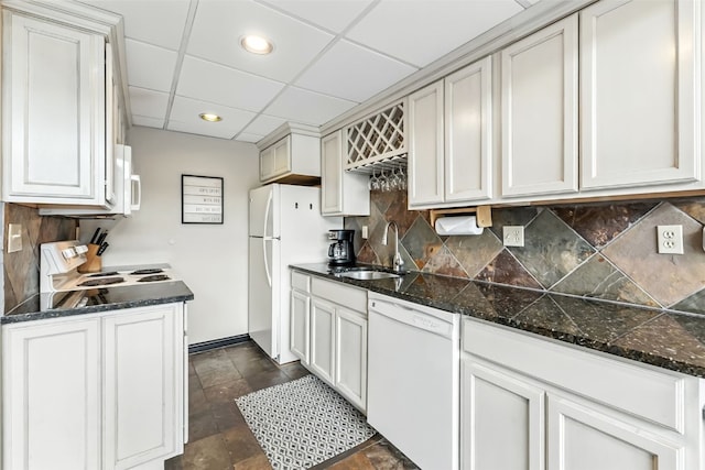 631 Village Rd Unit 34330, Breckenridge, CO 80424 - kitchen featuring white appliances, backsplash, dark stone finish floors, a paneled ceiling, and recessed lighting