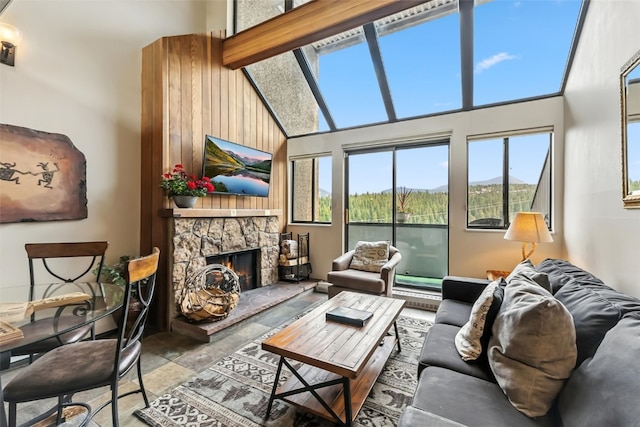 631 Village Rd Unit 34330, Breckenridge, CO 80424 - living room with a fireplace and a high ceiling