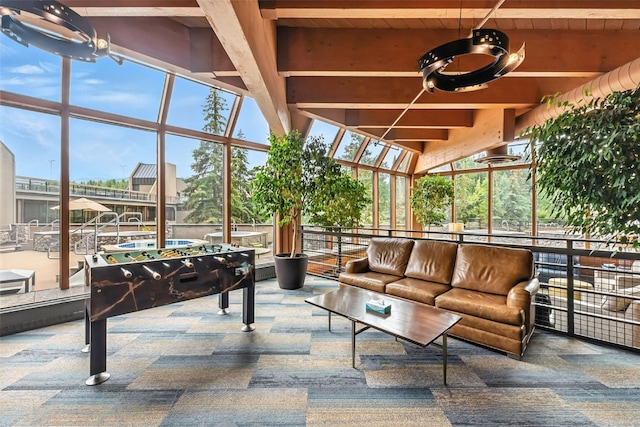 631 Village Rd Unit 34330, Breckenridge, CO 80424 - sunroom featuring healthy amount of natural light and beamed ceiling