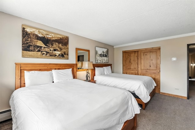 631 Village Rd Unit 34330, Breckenridge, CO 80424 - carpeted bedroom with a baseboard radiator and baseboards