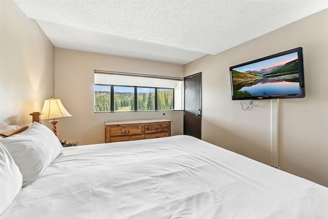 631 Village Rd Unit 34330, Breckenridge, CO 80424 - bedroom featuring a textured ceiling