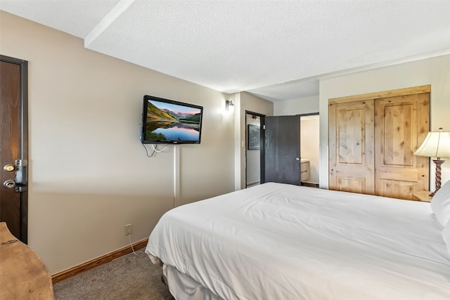 631 Village Rd Unit 34330, Breckenridge, CO 80424 - carpeted bedroom featuring a textured ceiling