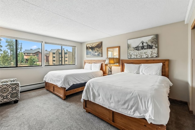 631 Village Rd Unit 34330, Breckenridge, CO 80424 - carpeted bedroom featuring baseboard heating and a textured ceiling