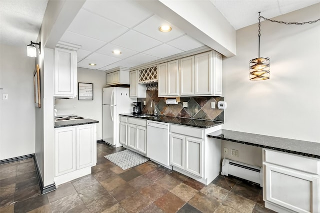 631 Village Rd Unit 34330, Breckenridge, CO 80424 - kitchen with a baseboard radiator, white appliances, recessed lighting, dark stone finish floors, and tasteful backsplash