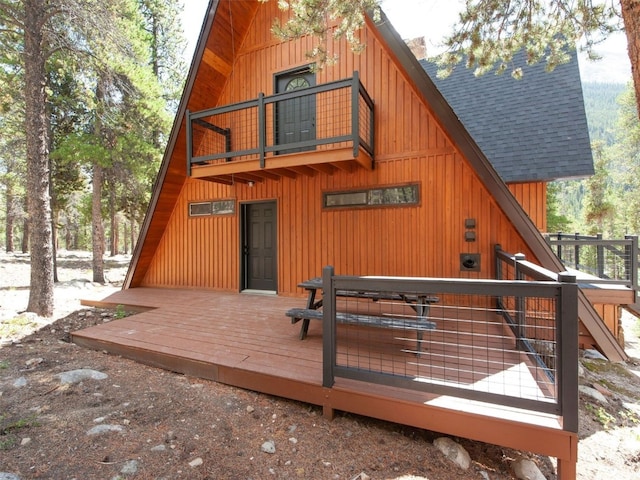 12715 E State Highway 82, Twin Lakes, CO 81251 - back of house with roof with shingles, a deck, and board and batten siding