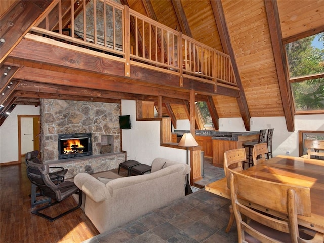 12715 E State Highway 82, Twin Lakes, CO 81251 - living room featuring wooden ceiling and a stone fireplace