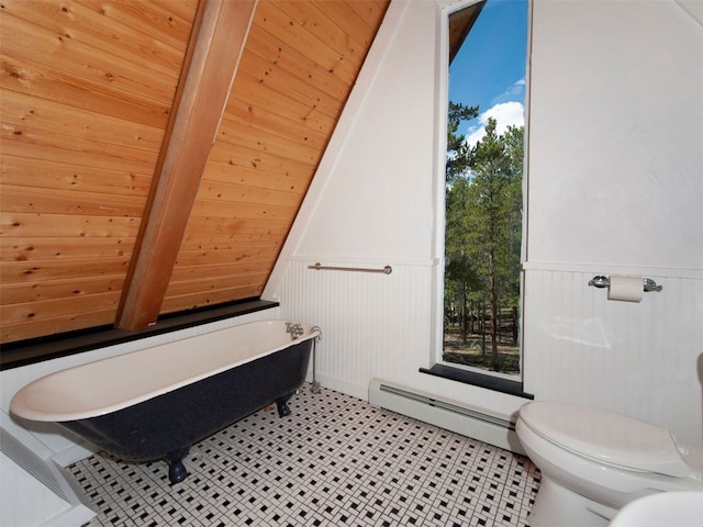 12715 E State Highway 82, Twin Lakes, CO 81251 - bathroom with a wainscoted wall, baseboard heating, a freestanding bath, and toilet