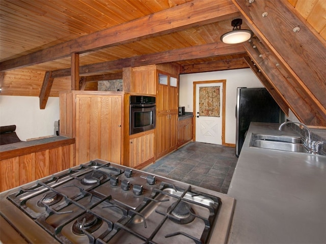 12715 E State Highway 82, Twin Lakes, CO 81251 - kitchen with appliances with stainless steel finishes, a sink, and wood ceiling with exposed beams
