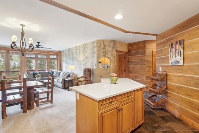 224 Trailhead Dr Unit 3075, Keystone, CO 80435 - living area featuring plenty of natural light, a fireplace, a ceiling fan, and carpet flooring