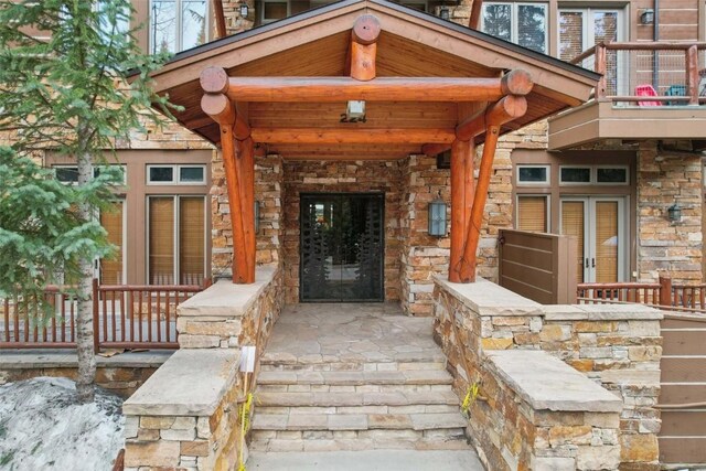 224 Trailhead Dr Unit 3075, Keystone, CO 80435 - half bathroom with tile walls, wainscoting, toilet, and visible vents