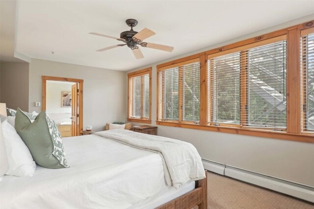 224 Trailhead Dr Unit 3075, Keystone, CO 80435 - carpeted bedroom with a ceiling fan, connected bathroom, and a baseboard heating unit