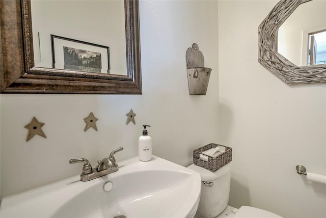 532 Kimmes Ln, Breckenridge, CO 80424 - half bath featuring toilet and a sink