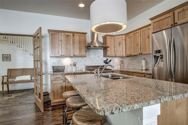 532 Kimmes Ln, Breckenridge, CO 80424 - kitchen with stainless steel refrigerator with ice dispenser, a sink, tasteful backsplash, light stone counters, and recessed lighting