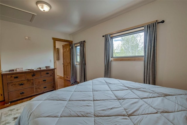 196 Vail Cir, Dillon, CO 80435 - bedroom with wood finished floors and attic access