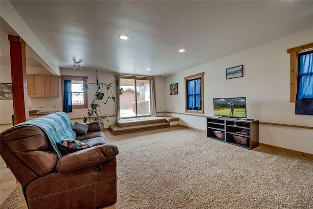196 Vail Cir, Dillon, CO 80435 - carpeted living area featuring baseboards and recessed lighting