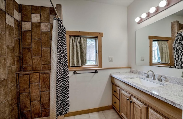 196 Vail Cir, Dillon, CO 80435 - full bath with vanity, tiled shower, and tile patterned flooring