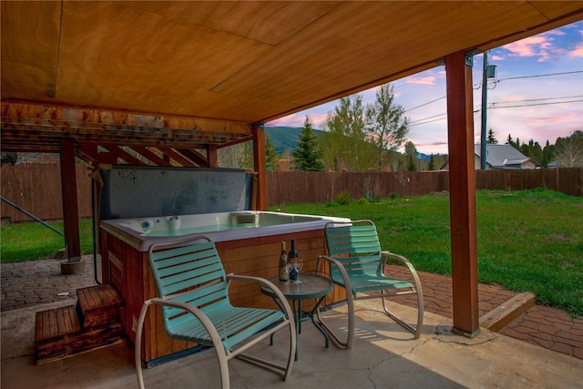 196 Vail Cir, Dillon, CO 80435 - fenced backyard featuring a hot tub and a patio