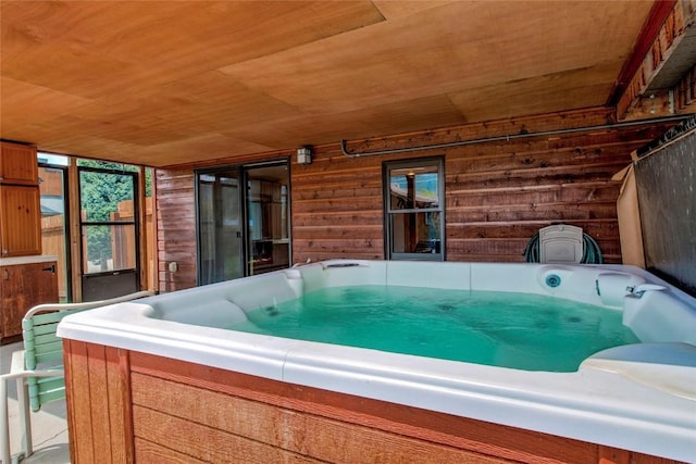 196 Vail Cir, Dillon, CO 80435 - miscellaneous room featuring a hot tub, wooden ceiling, and wooden walls