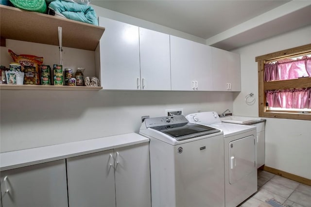 196 Vail Cir, Dillon, CO 80435 - washroom featuring cabinet space, separate washer and dryer, and light tile patterned floors