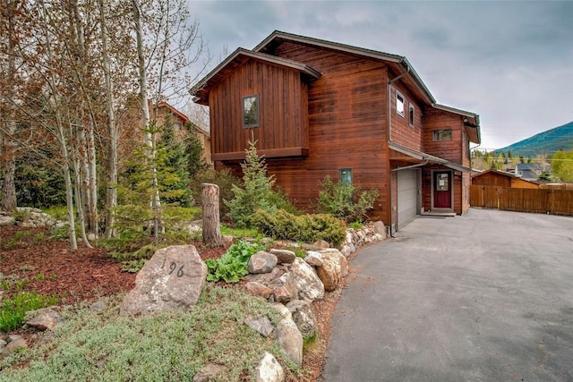 196 Vail Cir, Dillon, CO 80435 - view of front facade featuring driveway and a garage