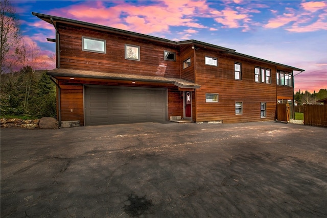196 Vail Cir, Dillon, CO 80435 - rustic home featuring an attached garage and driveway