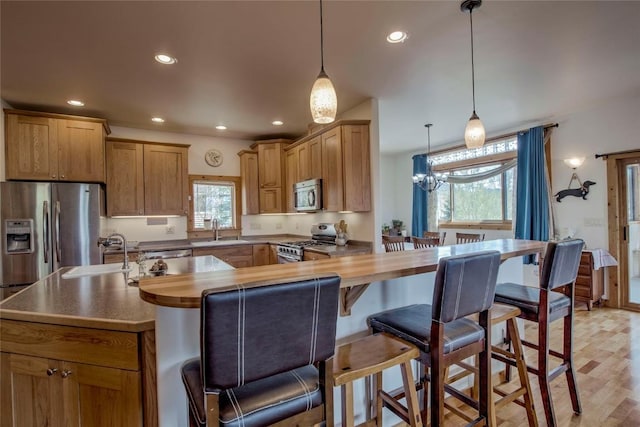 196 Vail Cir, Dillon, CO 80435 - kitchen with stainless steel appliances, healthy amount of natural light, recessed lighting, and wood counters