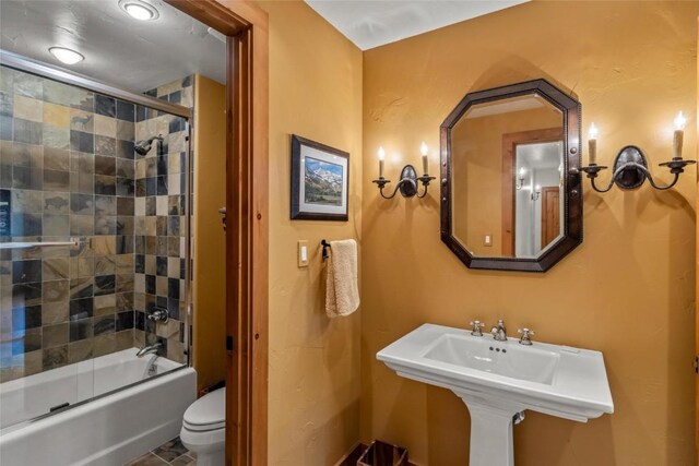 27800 Wapiti Way, Steamboat Springs, CO 80487 - full bathroom featuring toilet, enclosed tub / shower combo, and a sink
