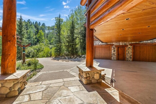 27800 Wapiti Way, Steamboat Springs, CO 80487 - view of patio / terrace featuring a forest view