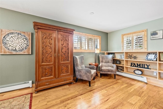 100 River Park Dr Unit 100A, Breckenridge, CO 80424 - living area with a baseboard radiator and wood finished floors
