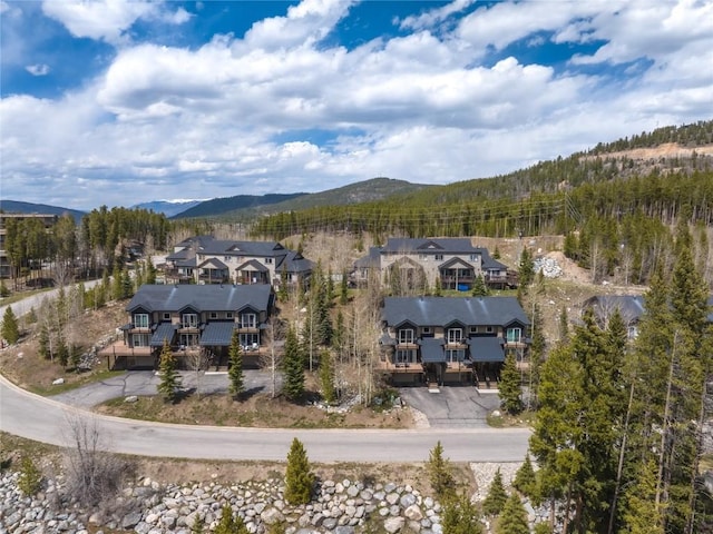 100 River Park Dr Unit 100A, Breckenridge, CO 80424 - aerial perspective of suburban area featuring a mountainous background and a heavily wooded area