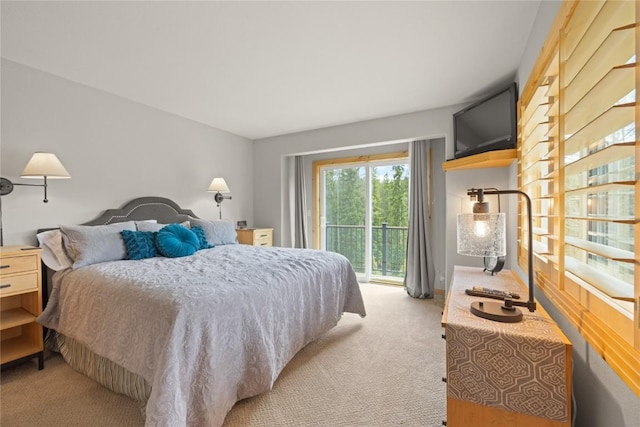 100 River Park Dr Unit 100A, Breckenridge, CO 80424 - bedroom with light colored carpet and access to exterior