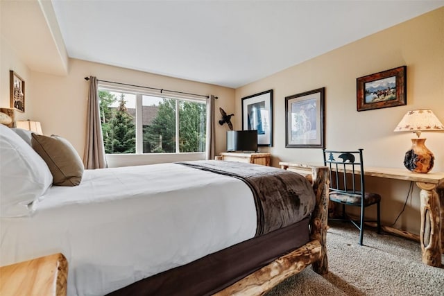 bedroom featuring carpet