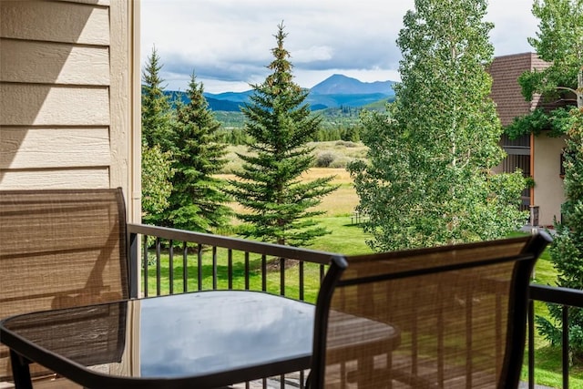 balcony featuring a mountain view