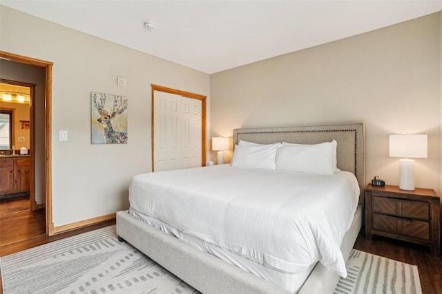 129 River Run Rd Unit 8055, Keystone, CO 80435 - bedroom with wood finished floors, a closet, and baseboards