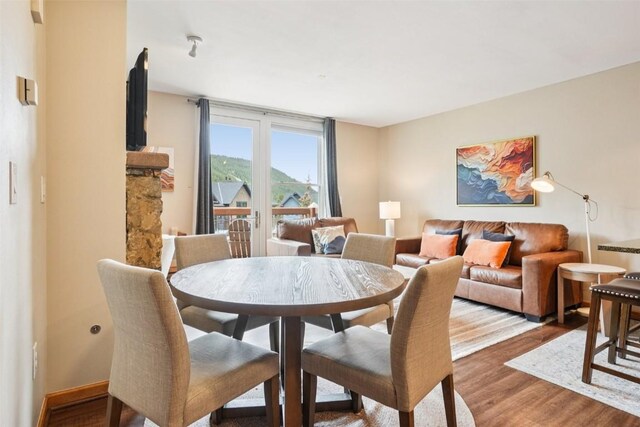 129 River Run Rd Unit 8055, Keystone, CO 80435 - dining space featuring wood finished floors