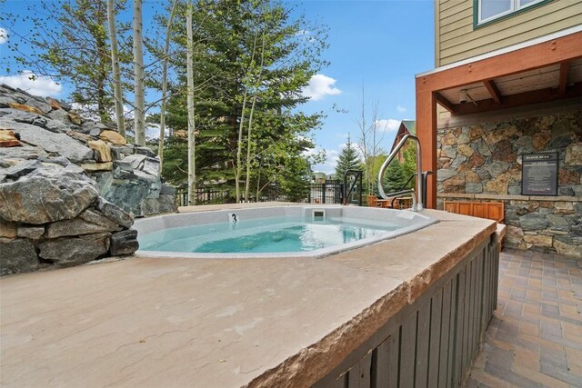 129 River Run Rd Unit 8055, Keystone, CO 80435 - view of pool featuring a hot tub and a patio area
