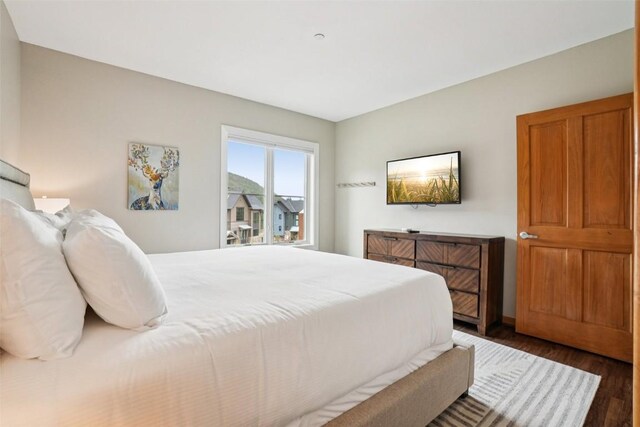 129 River Run Rd Unit 8055, Keystone, CO 80435 - bedroom with dark wood-style flooring