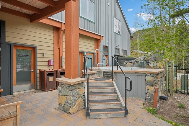 129 River Run Rd Unit 8055, Keystone, CO 80435 - property entrance featuring board and batten siding and a patio area