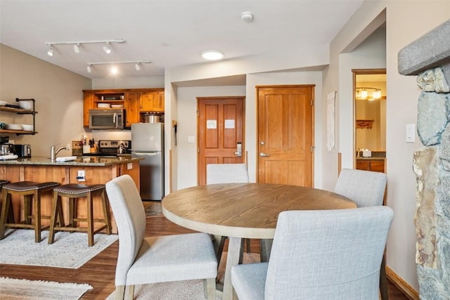129 River Run Rd Unit 8055, Keystone, CO 80435 - dining room with dark wood-style floors