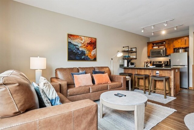 129 River Run Rd Unit 8055, Keystone, CO 80435 - living room featuring dark wood-style floors