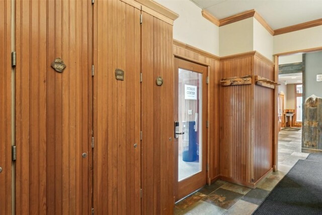 129 River Run Rd Unit 8055, Keystone, CO 80435 - foyer entrance featuring ornamental molding and wood walls
