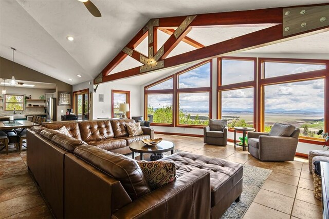 651 Lamb Mountain Rd, Fairplay, CO 80440 - living area with vaulted ceiling, plenty of natural light, a ceiling fan, recessed lighting, and tile patterned floors