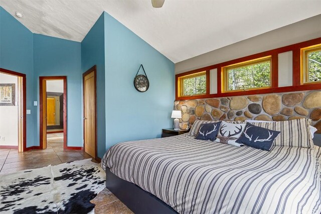 651 Lamb Mountain Rd, Fairplay, CO 80440 - tiled bedroom with lofted ceiling and ceiling fan
