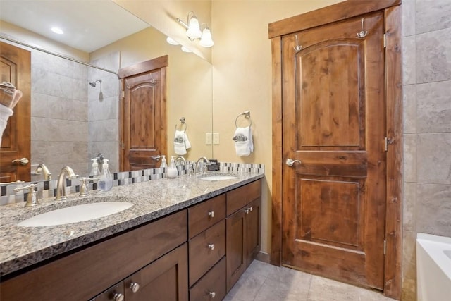 0050 County Road 1293 Unit B, Silverthorne, CO 80498 - bathroom with tile patterned flooring, a washtub, a sink, and double vanity