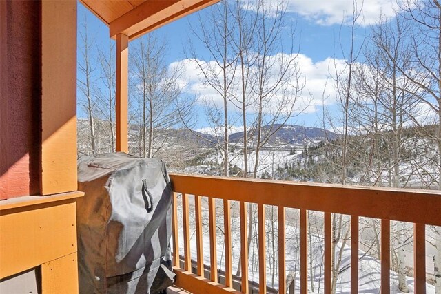 0050 County Road 1293 Unit B, Silverthorne, CO 80498 - snow covered deck featuring grilling area and a mountain view