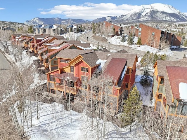 0050 County Road 1293 Unit B, Silverthorne, CO 80498 - snowy aerial view with a mountain view and a residential view